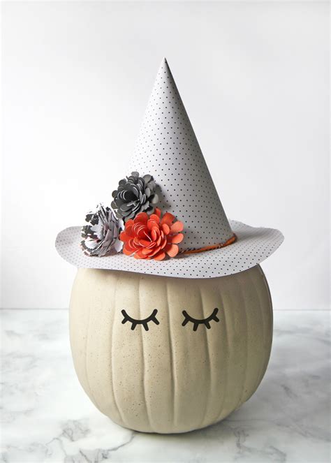 Spooky pumpkin with a witch hat for halloween